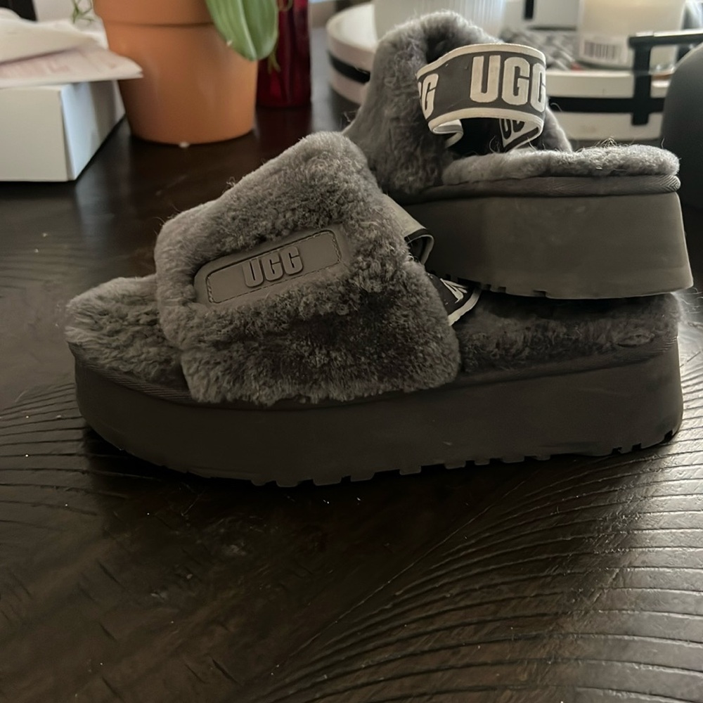 Woman’s authentic Ugg slip on. Size 7, no box gently used.